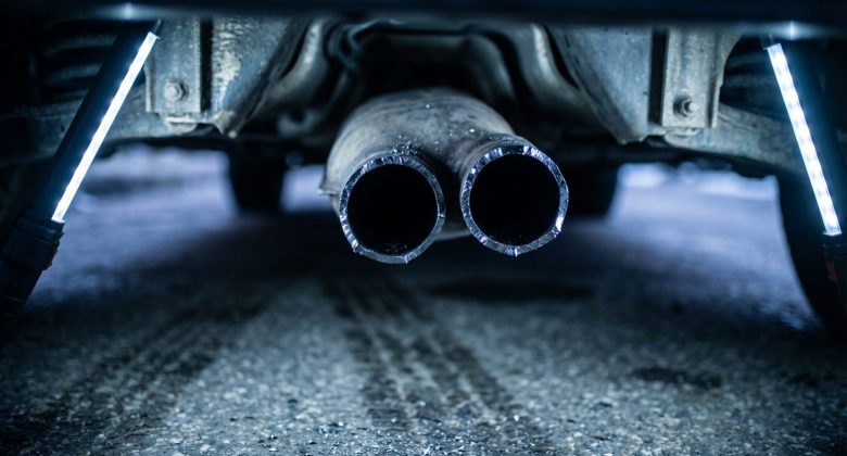 Editorial photograph of a close-up on the jagged, freshly cut edges of a car's c